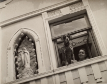 Woman and Dog in Window